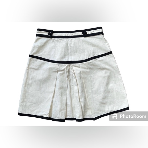 ✨FREE PEOPLE CREAM AND BLACK PLEATED SKIRT✨ - Picture 2 of 7